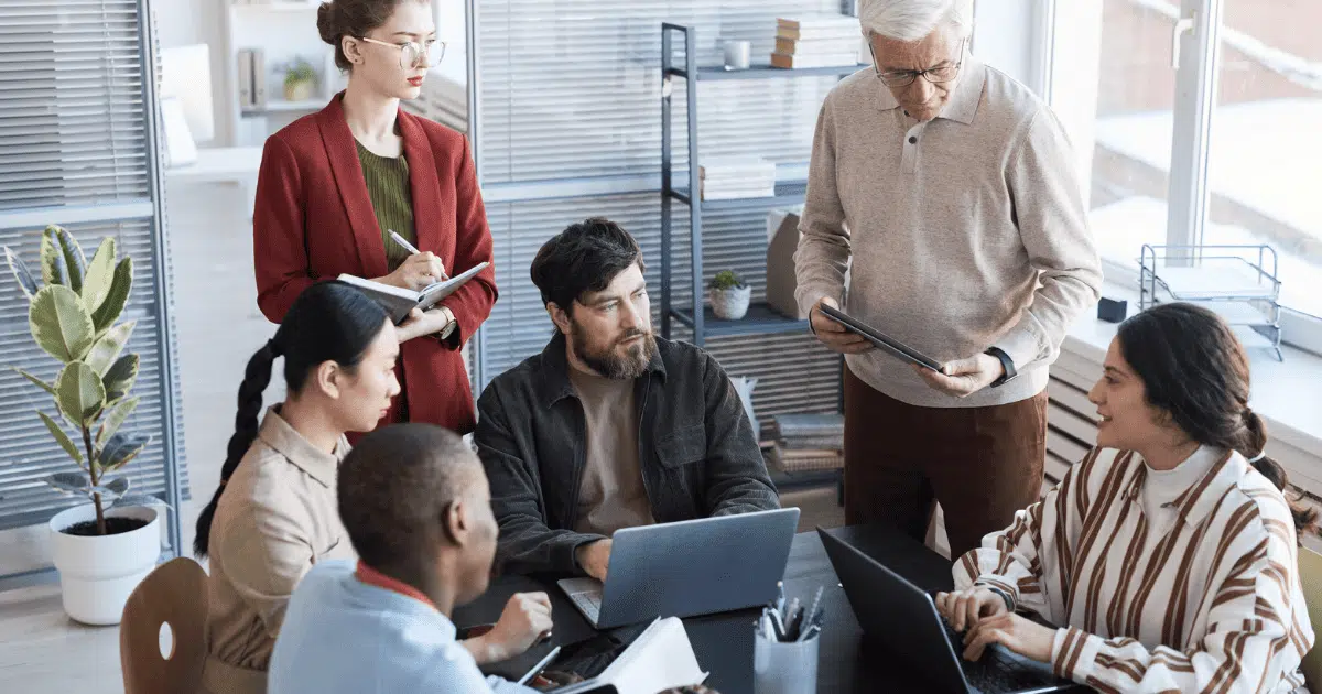 Team having a meeting in modern office space.